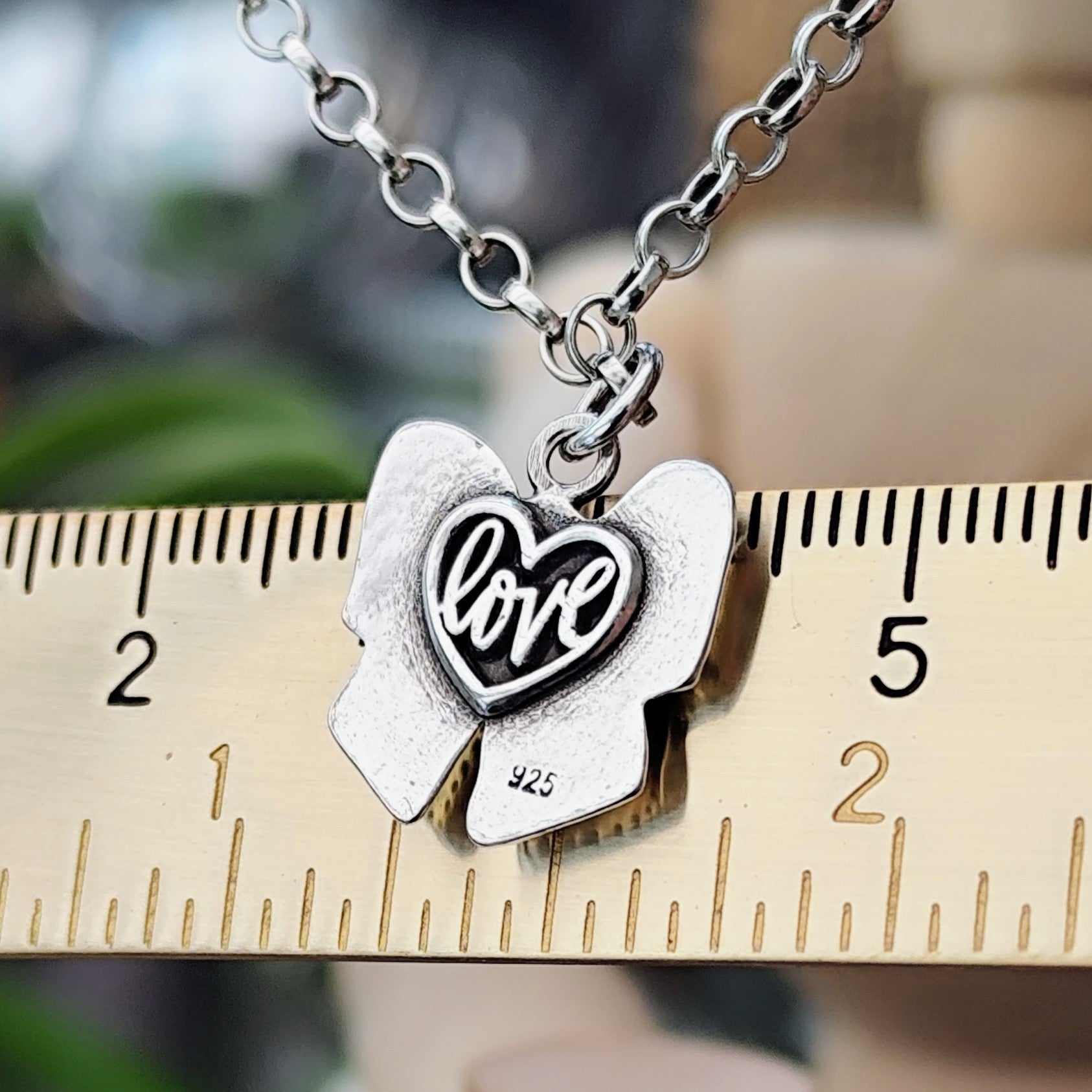 Kettenanhänger "Schleife" aus recyceltem Silber