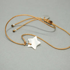 Armband "Muschel - Stern" mit Bedeutung in weiß - silber_Schmuck_handmade_animoART