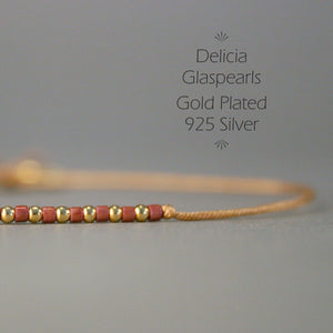 Armband in Gold - Rotbraun "Delica Fine Pearls" Textilband + Schiebeknoten_Schmuck_handmade_animoART