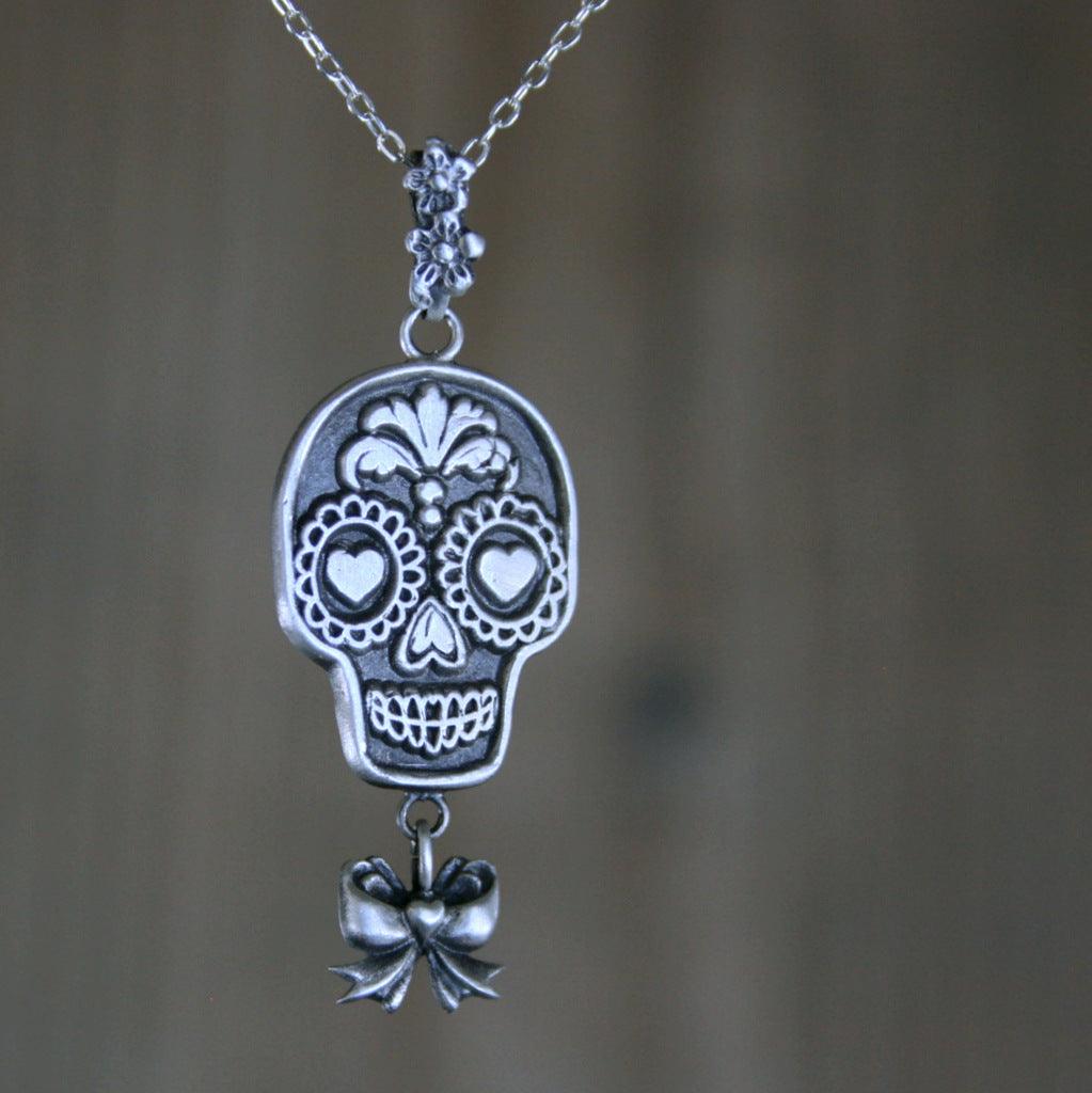 Kettenanhänger "La Catrina mit Schleife" handgefertigt aus recyceltem 925er Silber - animoART