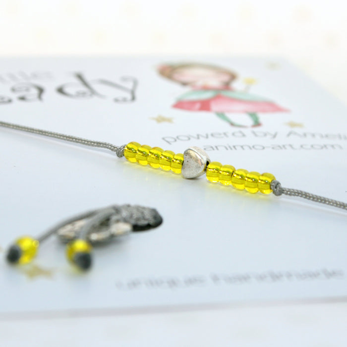 Kinder-Armband "Herz" mit gelben Rocailles-Perlen