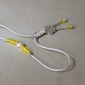 Kinder-Armband "Herz" mit gelben Rocailles-Perlen - animoART