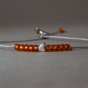 Kinder-Armband "Herz" mit Rocailles-Perlen in orange - animoART